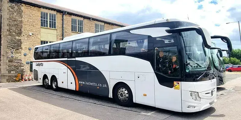Lucketts Travel side view of coach